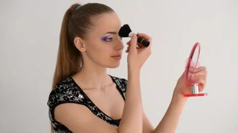 Applying blusher Stock Footage 20465493