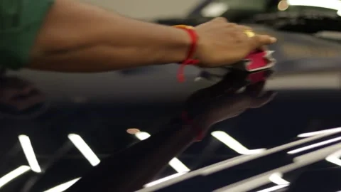 Applying ceramic coating on car Stock Footage 236741574