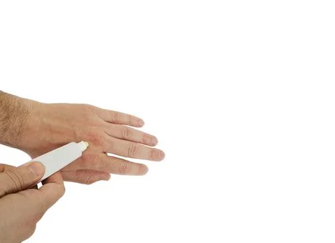 Applying cream. Stock Photos