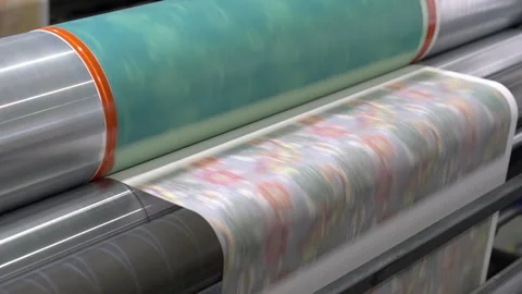 Applying digital printing to packaging sheet using equipment Stock Footage 296577906