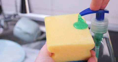 Applying Dishwashing Detergent on Sponge Close-Up Stock Footage 327650743