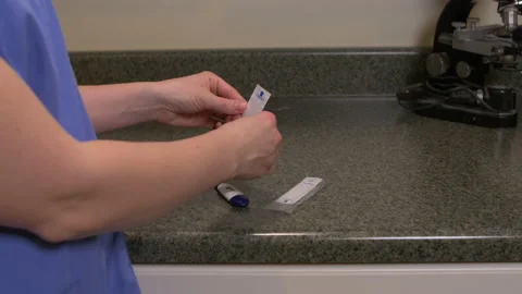 Applying disposable thermometer cover Video stock 142538636