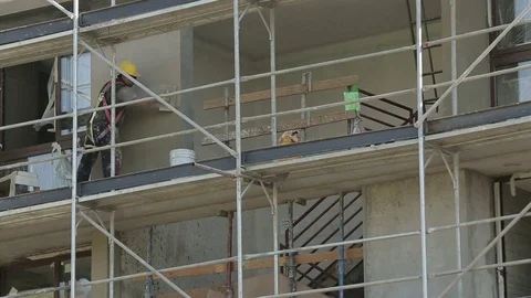 Applying drywall Stock Footage 77049288