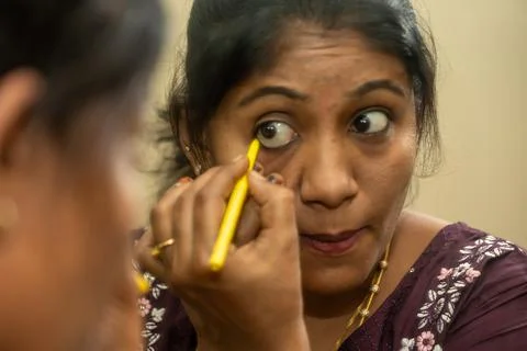 Applying Eyeliner Stock Photos