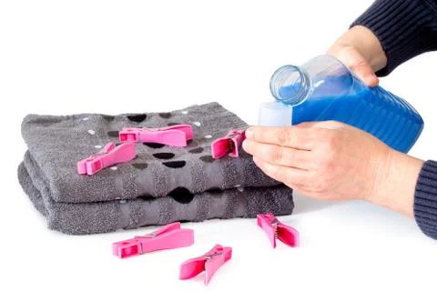 Applying fabric softener Foto stock
