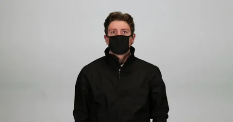 Applying a Face Mask 스톡 동영상 131177719