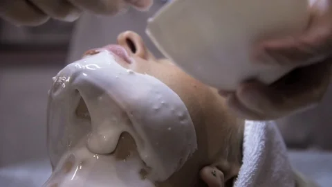 Applying Final Facial Mask At Spa Salon Stockbeeldmateriaal 73737602