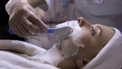 Applying Final Facial Mask At Spa Salon Stock Footage 73737633