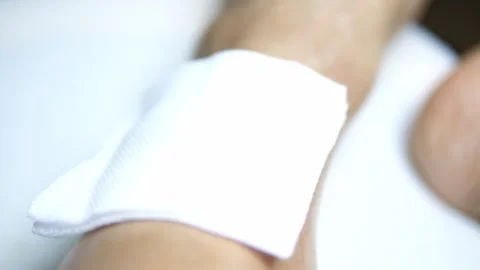 Applying Gauze and Medical Tape on Wound First Aid Treatment Video stock 329354853