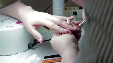 Applying gel nail polish Stock Footage 65746334