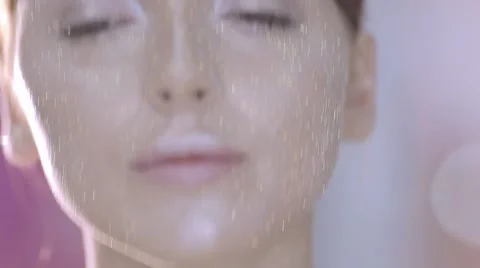 Applying glitter to the face Stock Footage 67674818