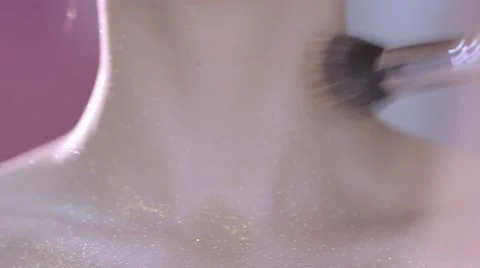 Applying glitter to the face 스톡 동영상 67674823