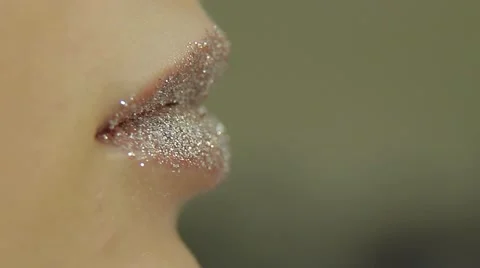 Applying glitter lips brush Stock Footage 68534105