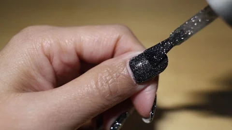 Applying Glitter Nail Polish Sequence Stock Footage 283976890