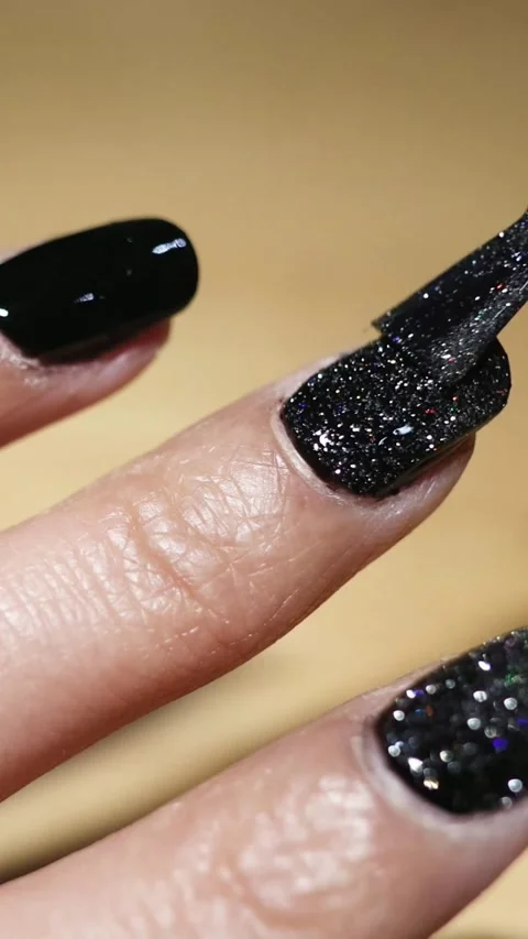 Applying Glitter Nail Polish Sequence Stock Footage 304474780