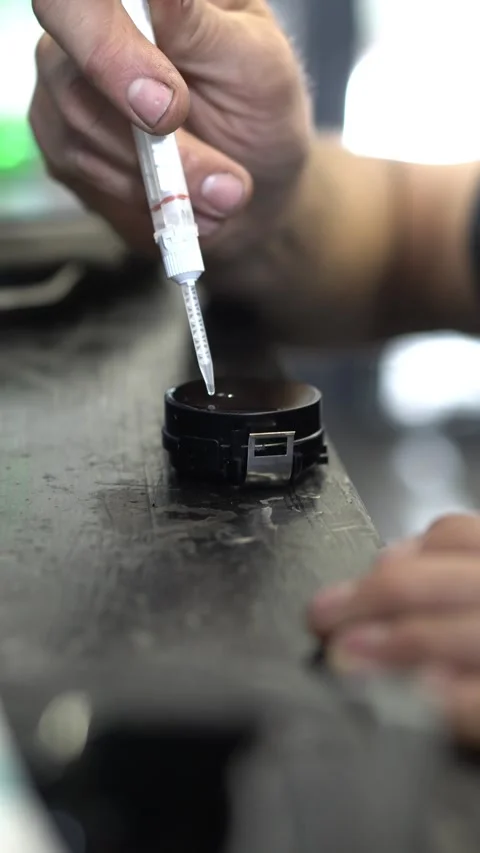 Applying glue to the surface of the sensor Stock Footage 314793753
