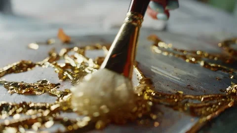 Applying Gold Leaf to Resin Artwork 스톡 동영상 280535160