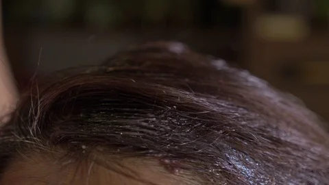 Applying Hair Dye-macro Stock Footage 101825394