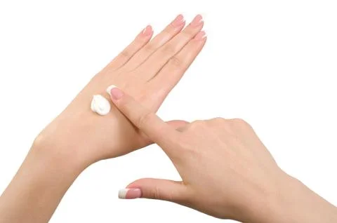 Applying hand cream. Stock Photos