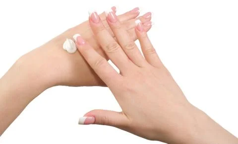 Applying hand cream. Stock Photos