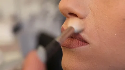 Applying highlighter with a fan brush Stock Footage 81290837