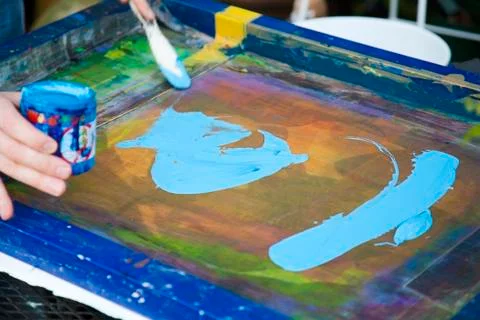 Applying ink to silk screen Foto stock