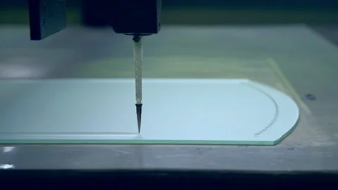Applying lines picture on the glass elements of door. Machine moves and leaves Stock Footage 204789152