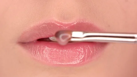 Applying lipstick on lips close up Stock Footage 112287118