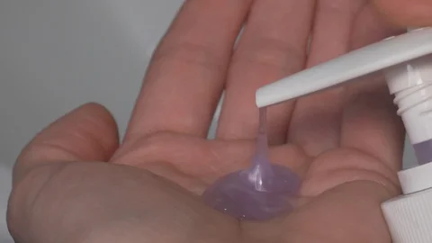 Applying liquid soap on hand Stock Footage 97708252