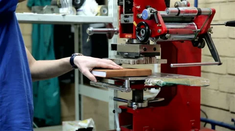 Applying the logo. Production. Conveyor. Stock Footage 59688477