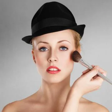 Applying make-up Stock Photos