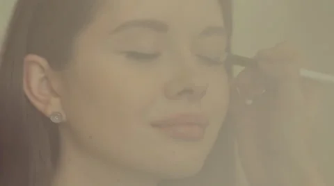 Applying of makeup base on model's face Stock Footage 50358344