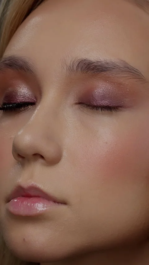 Applying Makeup on Eyelids Close-Up Stock Footage 263845438