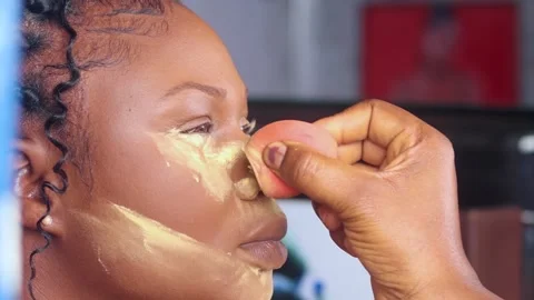Applying makeup foundation on face of a model	 Stock-Footage 239588932
