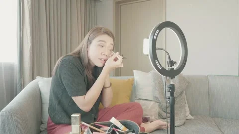 Applying Makeup with LED Ring Light Stock Footage 319415068