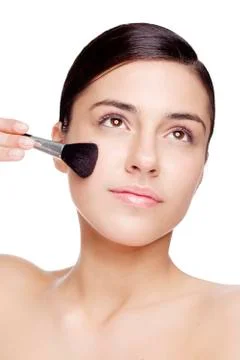 Applying makeup Stock-Fotos