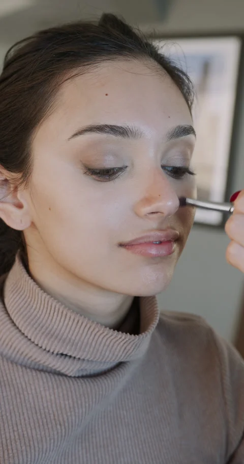 Applying makeup with skilled artist, Closeup view of makeup application 스톡 동영상 321037784