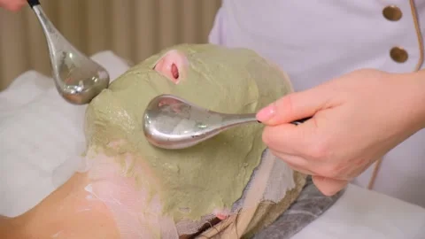 Applying a mask for cosmetic procedures Stock Footage 168215037