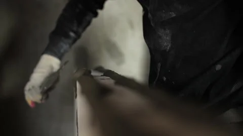 Applying masonry mortar for interior wall panels Stock Footage 326824547