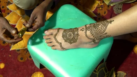 Applying Mehndi Design on Foot Stock Footage 341655812