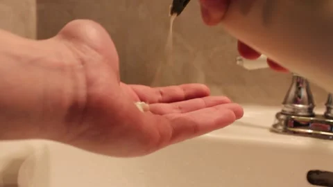 Applying Moisturizer To Hands Stock Footage 237722554