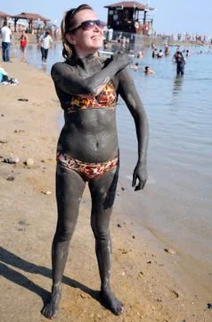 Applying mud Stock Photos