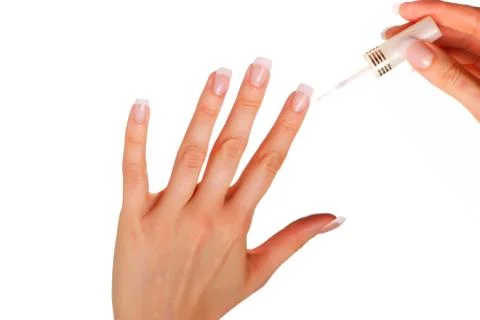 Applying nail polish Stock Photos