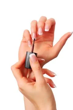 Applying nail polish Stock Photos