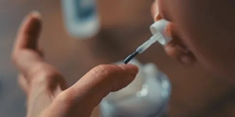 Applying nail polish to your nails at home. Close-up.4K. Nail polish remover Stock Footage 293893030