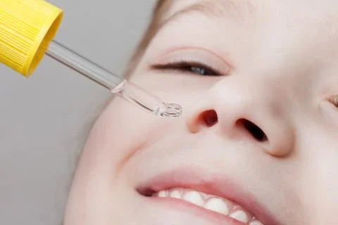 Applying nasal dropper Stock Photos