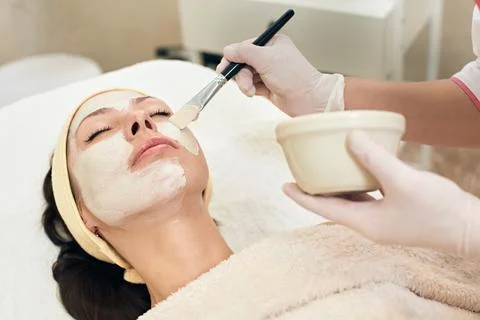 Applying peeling mask Foto stock