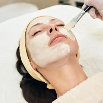 Applying peeling mask Stock Photos