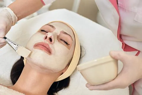 Applying peeling mask Stock Photos