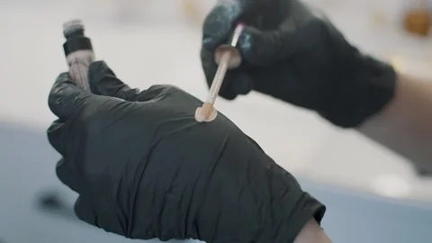 Applying permanent cosmetics in slow motion at a beauty salon examination Video stock 309191801